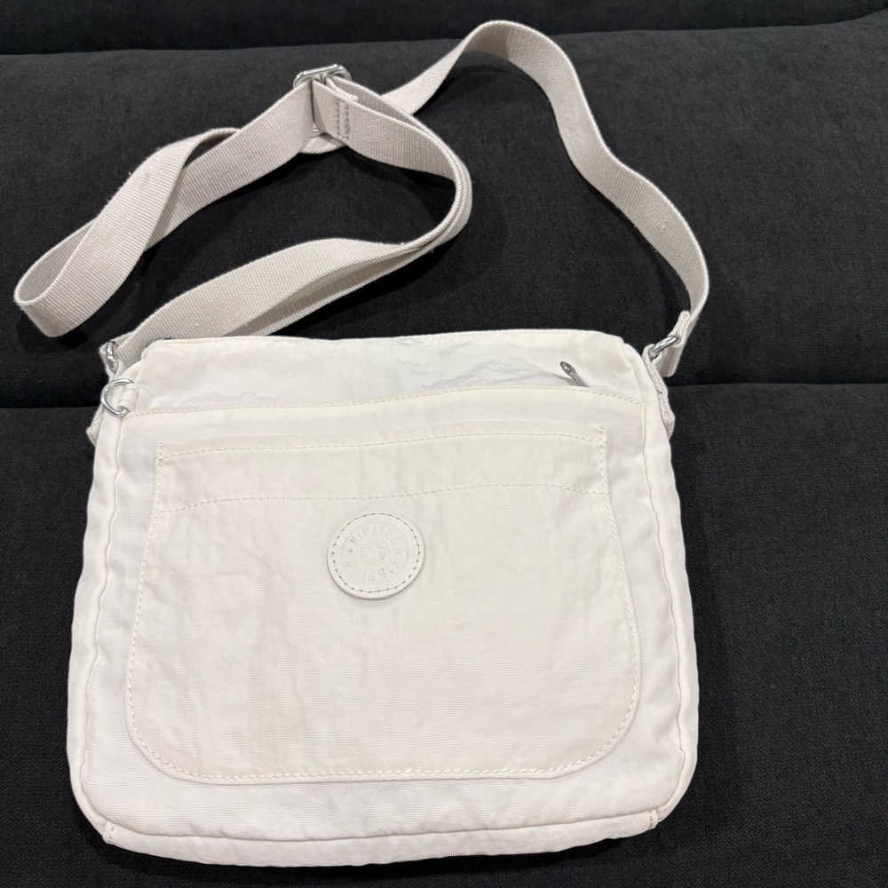 Kipling Light Cream Round Logo Crossbody Accent